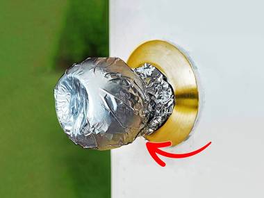Wrap aluminum foil around door knob